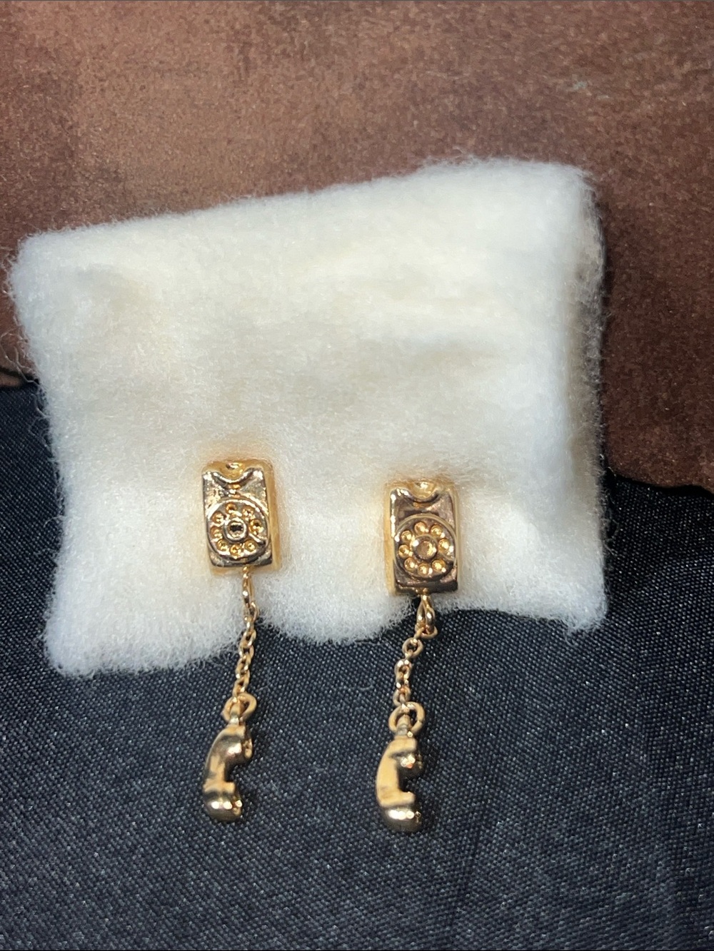 Avon vintage clip-on telephone, gold tone earrings.